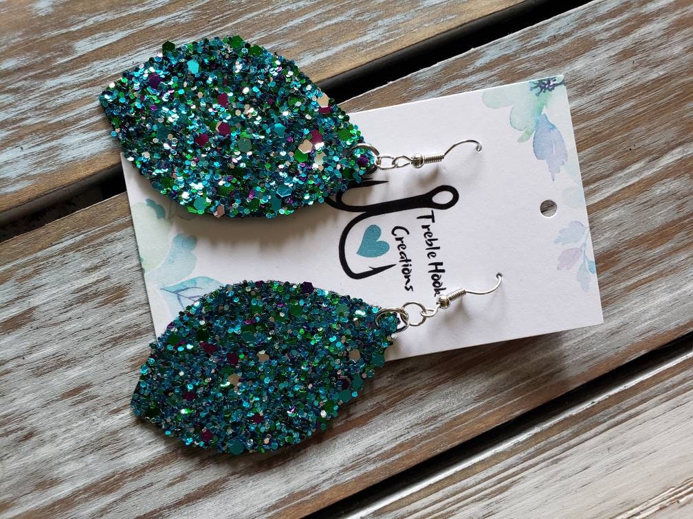 Blue glitter leaf shape earrings